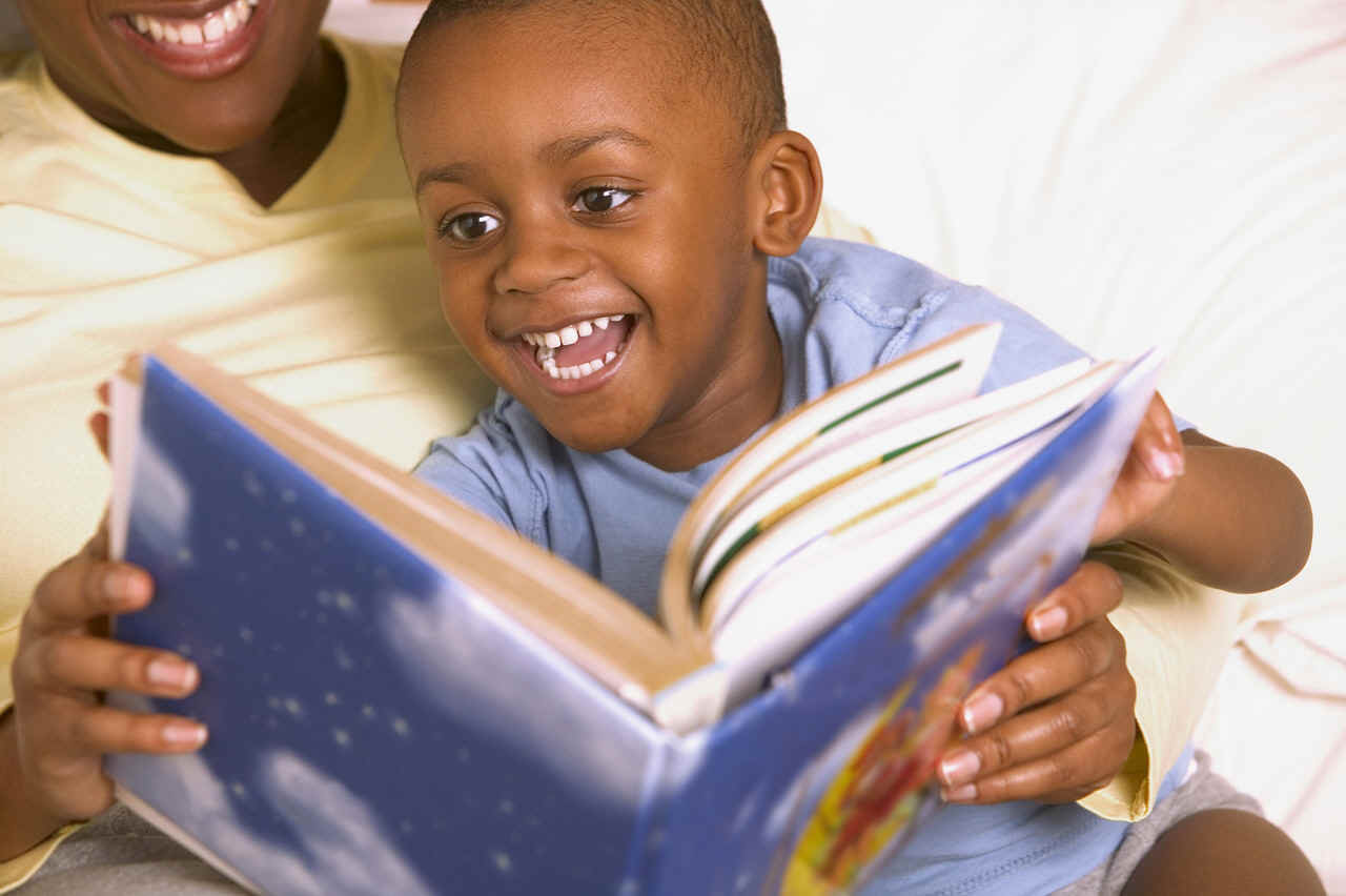 mom and son reading picture book